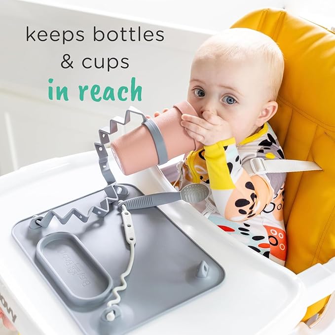 Busy Baby Bottle Bungee - Sippy Cup Strap - Keeps Bottles and Sippy Cups Off The Floor - Food Grade Silicone - Dishwasher Safe (Pink)