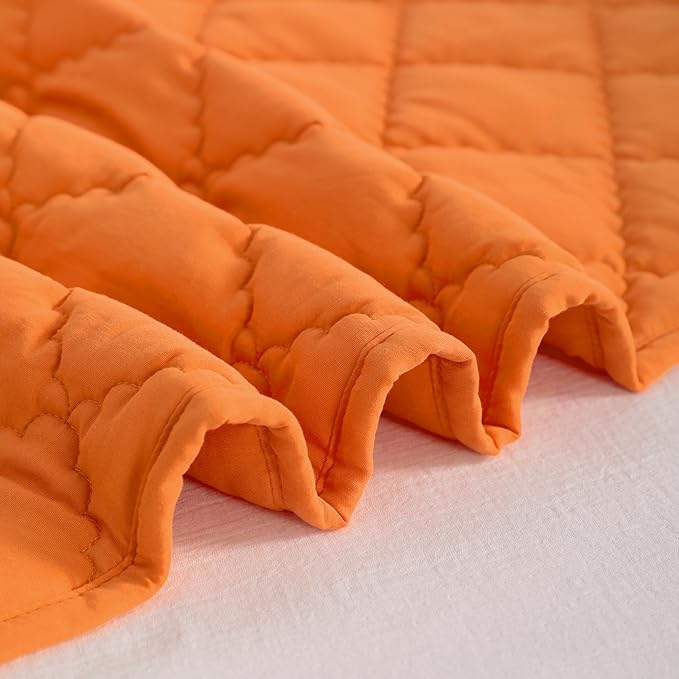 NTBAY Down Alternative Toddler Comforter, Lightweight and Warm Solid Color Baby Crib Quilted Blanket, 39x47 inches, Orange