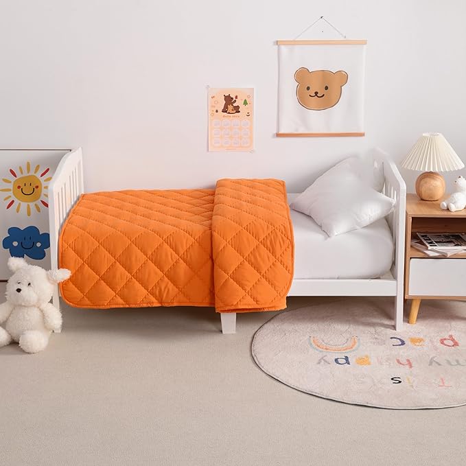 NTBAY Down Alternative Toddler Comforter, Lightweight and Warm Solid Color Baby Crib Quilted Blanket, 39x47 inches, Orange